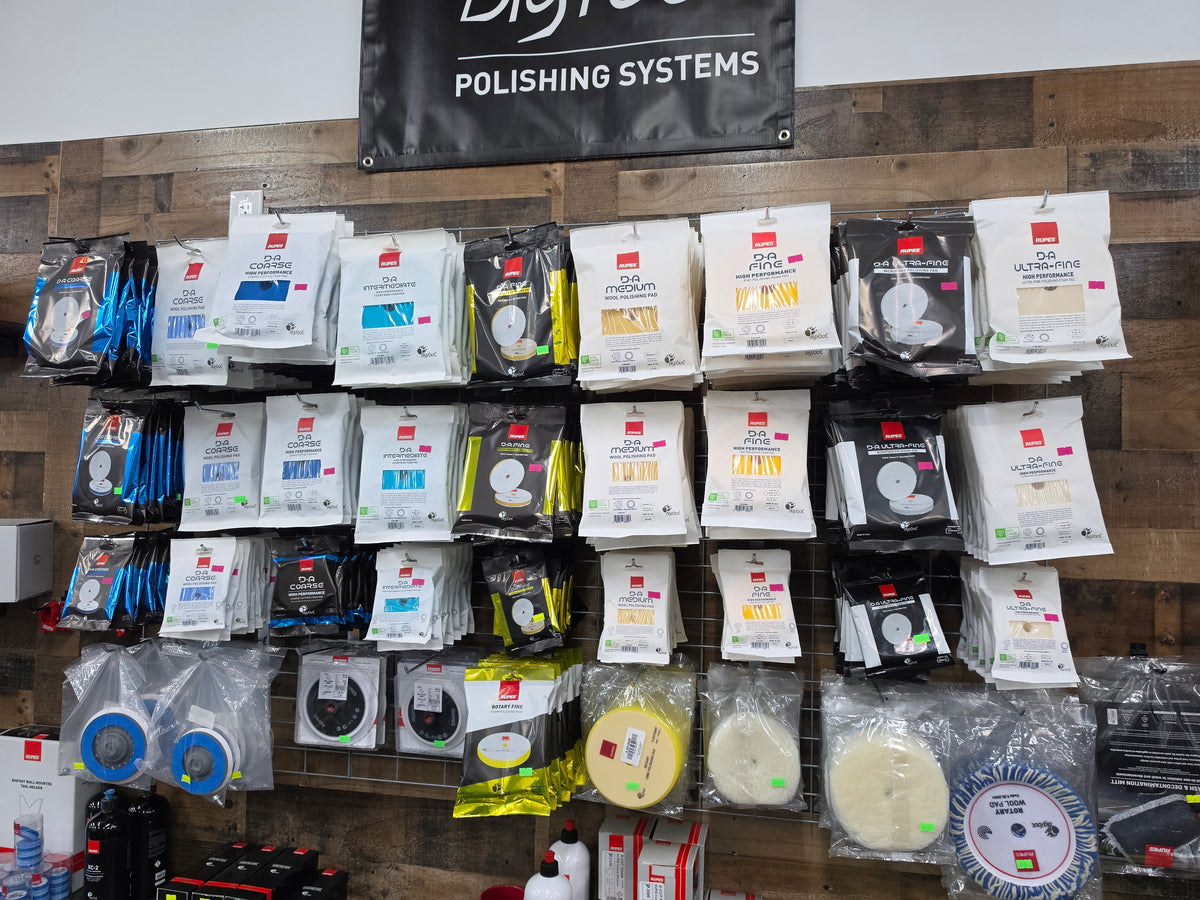 Wall of Rupes BigFoot polishing pads at Detail Supplies of Houston